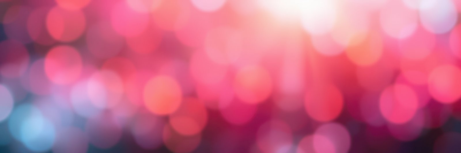 Colorful bokeh lights create a festive atmosphere during an evening celebration in an urban setting